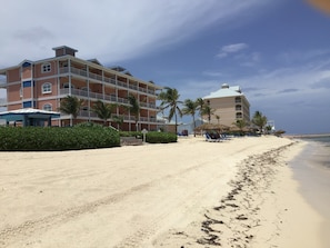 On the beach, sun loungers, beach towels