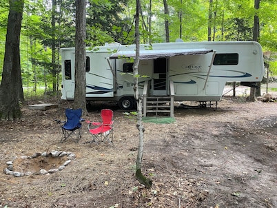 Betsie  - Excellent 35Ft RV Camper in the Woods  Fire Pit & Hot Tub Access