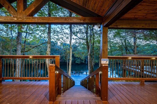 Worth the Wait ~ Riverfront cabin with hot tub, game room, play set and views!