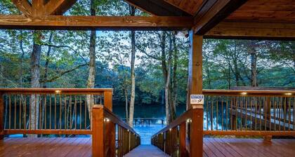 Worth the Wait ~ Riverfront cabin with hot tub, game room, play set and views!