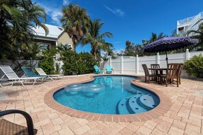 Outdoor pool, a heated pool - Beachy Boathouse Cottage, 2 BR,1BA, Private Pool, Steps to Beach and Bay- (Anna Maria)