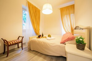 Family Apartment, Multiple Bedrooms, Lakeside (Lenno Giardinetto) | 2 bedrooms, iron/ironing board, free WiFi, bed sheets