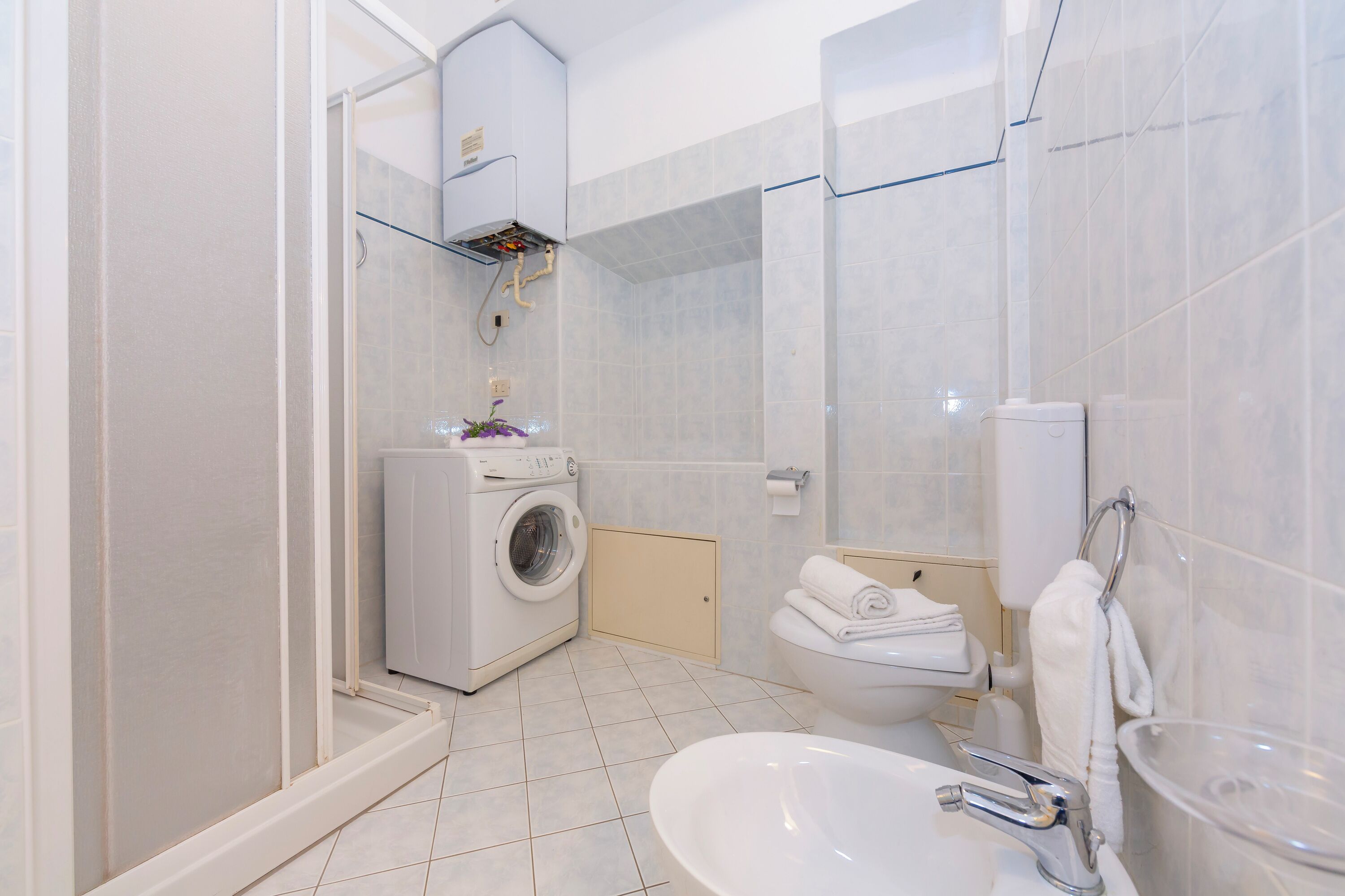 Family Apartment, Multiple Bedrooms, Lakeside (Casa Mira Al Lago) | Bathroom | Shower, rainfall showerhead, hair dryer, bidet