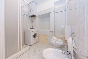 Family Apartment, Multiple Bedrooms, Lakeside (Casa Mira Al Lago) | Bathroom | Shower, rainfall showerhead, hair dryer, bidet