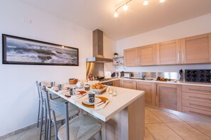Family Apartment, Multiple Beds, Garden Area (Bellano Terrazzo) | Private kitchen | Full-size fridge, microwave, oven, stovetop - Bellano Terrazzo (Bellano)