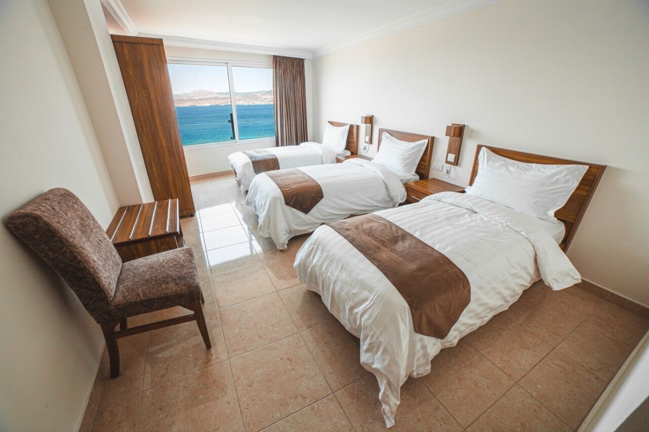 Suite Deluxe, vista mare | Minibar, Wi-Fi gratuito