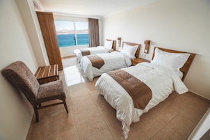 Deluxe Suite, Sea View | Minibar, free WiFi