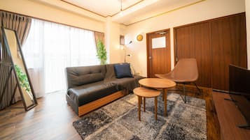 Entire Apartment, Non Smoking | Living room | Flat-screen TV