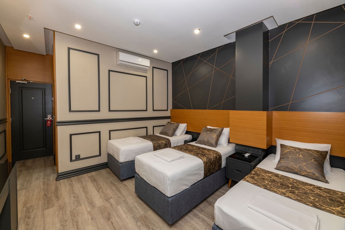 Deluxe Triple Room