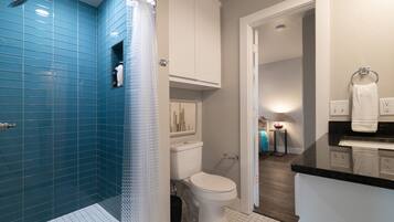 Shower, hair dryer, towels
