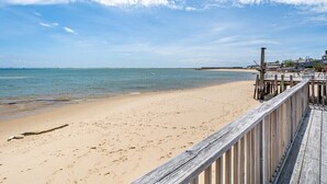 On the beach, sun loungers, beach towels - Waterfront Condo-fully renovated, in the desirable West End, steps to the beach. (Provincetown)