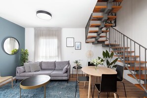 City Apartment, 2 Bedrooms | Living area | 42-inch flat-screen TV with digital channels, plasma TV, Netflix - AirTLV - Arlozorov Apartment's (Ramat Gan)