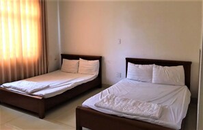 Habitación estándar con 2 camas individuales | Wifi gratis y ropa de cama