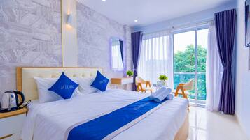 Quarto superior | Frigobar, escrivaninha, Wi-Fi de cortesia, roupa de cama