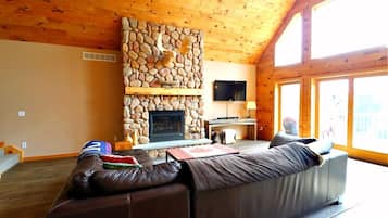 Chalet, 4 Bedrooms | Living room | Fireplace