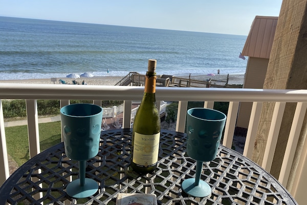 Relaxing afternoon on ocean front balcony