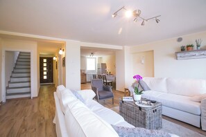 Family Townhome, Multiple Bedrooms, Mountainside (Plesio Rustico Panoramica) | Living area | Flat-screen TV - Plesio Rustico Panoramica (Plesio)