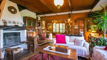 Family Chalet, Multiple Beds, Garden Area (Argegno Chalet) | Living room | TV, DVD player