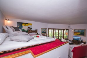 Chalet Keluarga, Beberapa Tempat Tidur, area taman (Argegno Chalet) | 3 kamar tidur, setrika/meja setrika, dan seprai linen