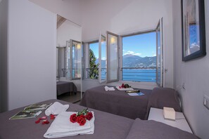Attico familiare, 6 camere da letto, lato montagna (Paradiso di Menaggio Penthouse) | 6 camere, ferro/asse da stiro, Wi-Fi gratuito, lenzuola