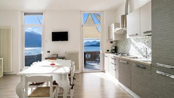 Family Apartment, Multiple Bedrooms, 2 Bathrooms, Lakeside (Menaggio Tosca 3) | Private kitchen | Full-size fridge, microwave, oven, stovetop