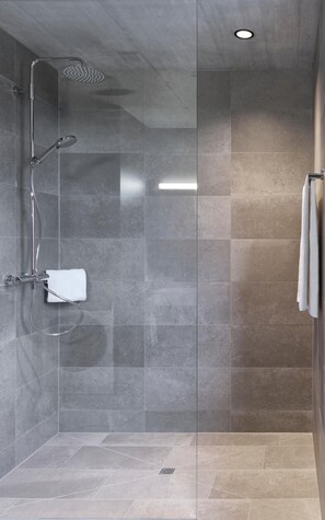 Shower, hair dryer, heated floors, towels
