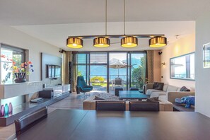 Family Apartment, Multiple Bedrooms, Mountainside (Sant' Andrea Deluxe) | Living area | Flat-screen TV, stereo - Sant' Andrea Deluxe (Menaggio)