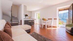 Honeymoon Townhome, 2 Bedrooms, Fireplace, Mountainside (Villa Patricia) | Living area - Villa Patricia (San Siro)
