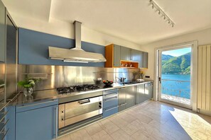 Family Villa, Multiple Bedrooms, Mountainside (Villa Isola Verde (Main Villa)) | Private kitchen | Microwave, oven, stovetop, dishwasher - Villa Isola Verde (Valsolda)