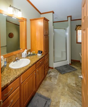 Combined shower/bathtub, hair dryer, towels, soap