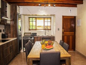 Luxury Chalet, 3 Bedrooms | Private kitchen | Full-size fridge, microwave, oven, stovetop - Inyamatane 227B Kruger Park Lodge (Mbombela)