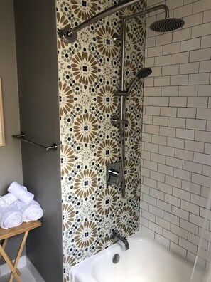 Shower, hair dryer, towels, soap