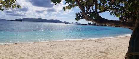 On the beach, sun-loungers, beach towels