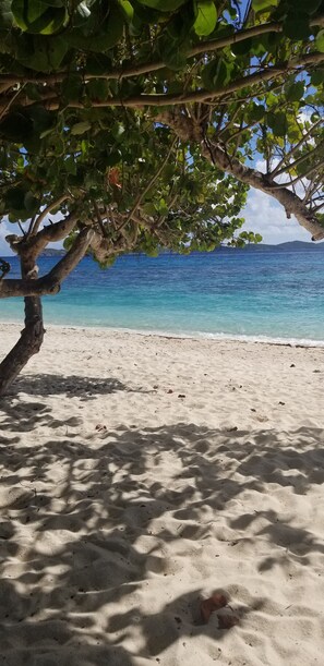 On the beach, sun-loungers, beach towels