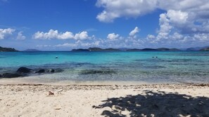 On the beach, sun-loungers, beach towels