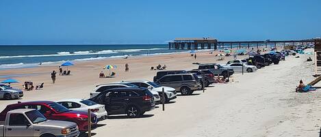 On the beach, sun loungers, beach towels