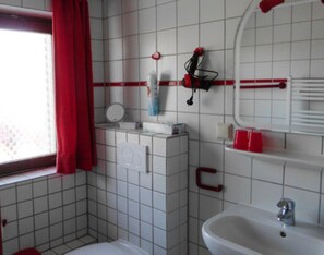 Shower, hair dryer, towels