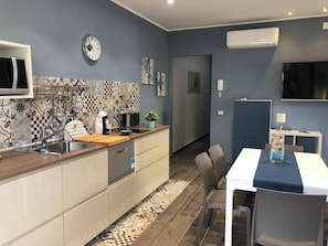Vila, 2 quartos, para fumantes, vista para o jardim | Sala de jantar