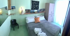 2 habitaciones y tabla de planchar con plancha 