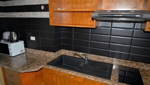 Condo, 1 phòng ngủ | Bếp riêng