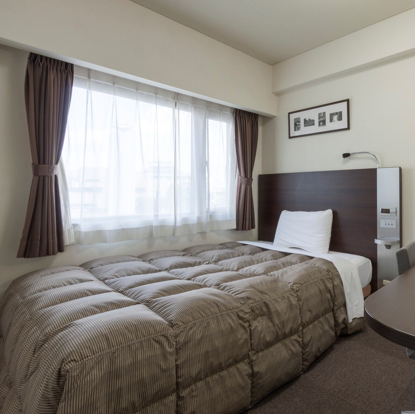 Down comforters, desk, blackout drapes, free WiFi