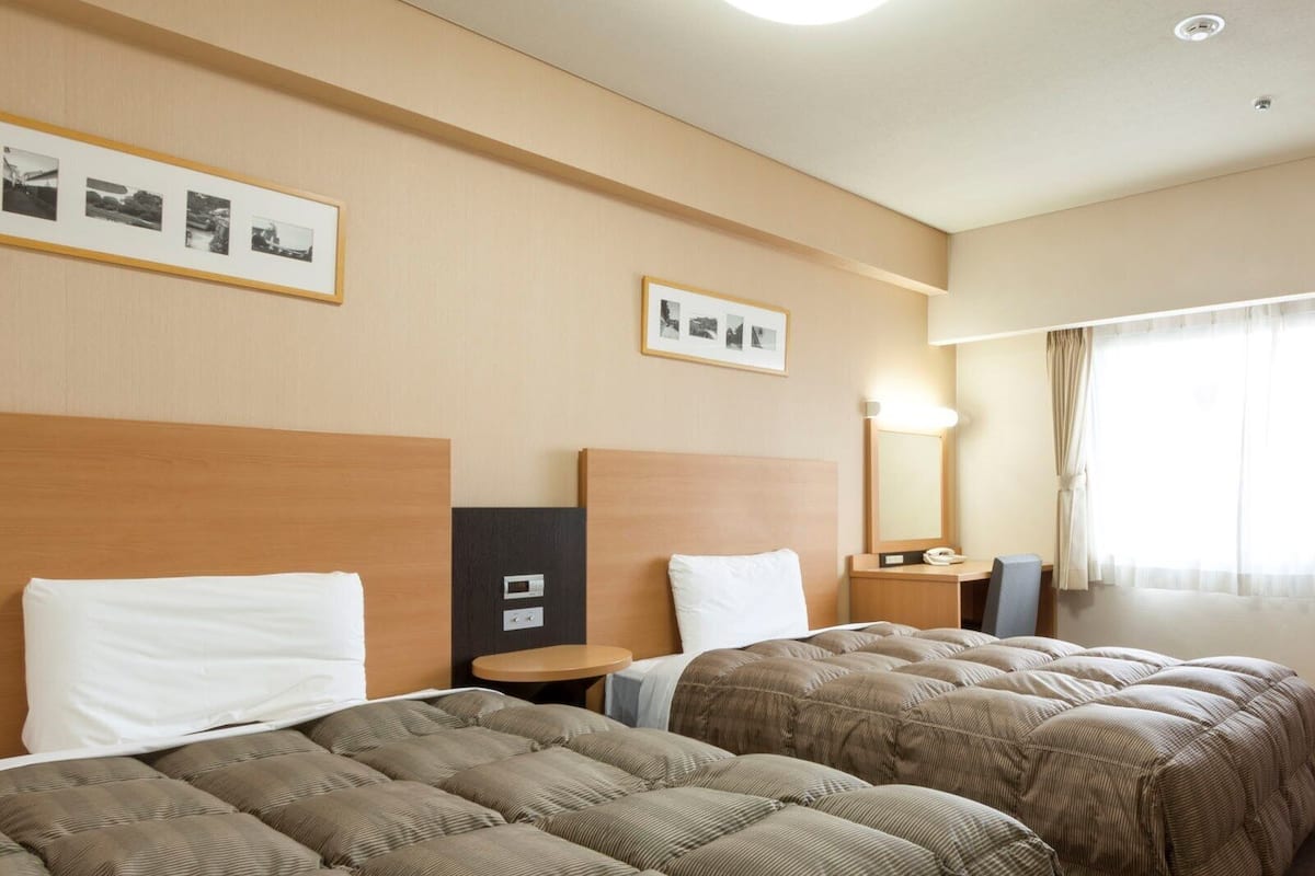 Down comforters, desk, blackout drapes, free WiFi