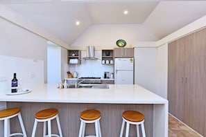 Coffee/tea maker, fridge, microwave, oven