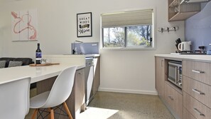 Fridge, microwave, dishwasher, coffee/tea maker