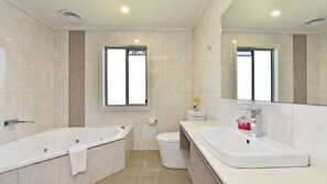 Shower, jetted bath, eco-friendly toiletries, hair dryer
