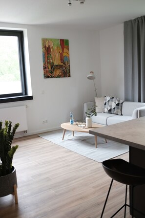 Classic Apartment, 1 Bedroom (incl. 75€ Cleaning Fee) | Living area | Flat-screen TV - aparthotel glück auf Düppelstrasse (Oberhausen)
