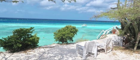 On the beach, sun loungers, beach towels
