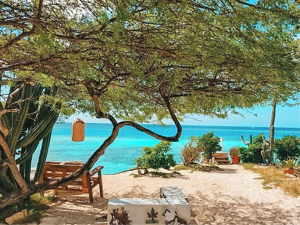 On the beach, sun-loungers, beach towels