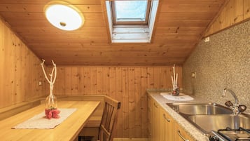 Fridge, stovetop, electric kettle, highchair