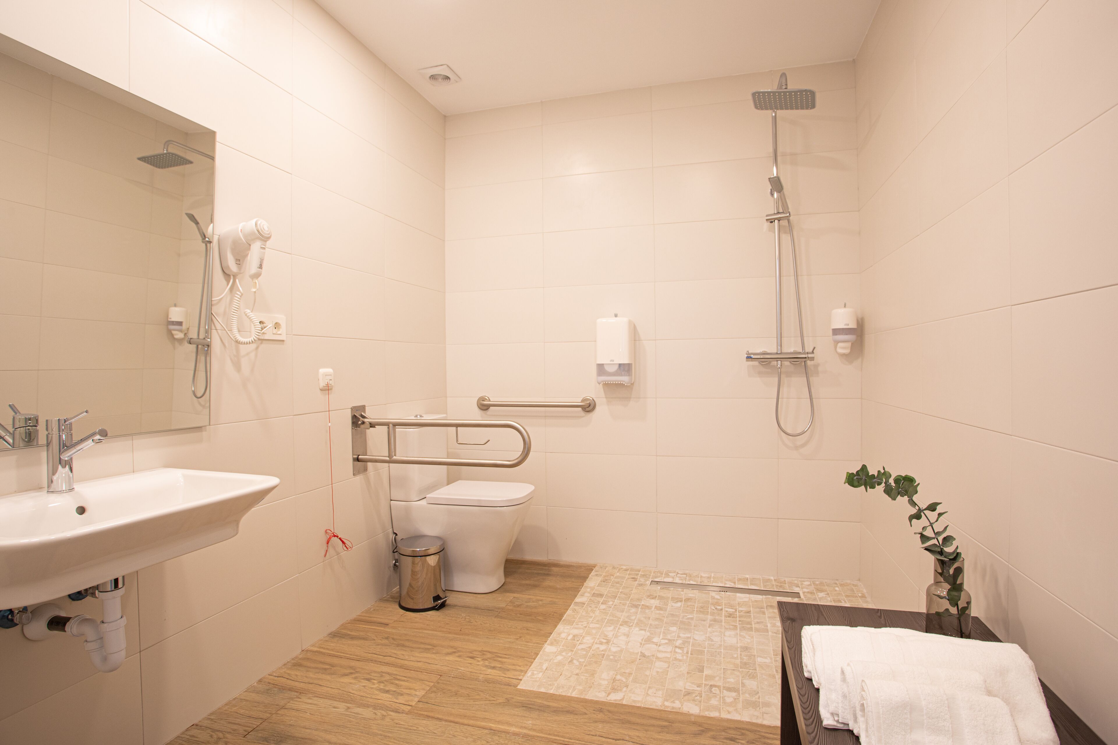 superior room | bathroom | shower, hair dryer, towels, soap